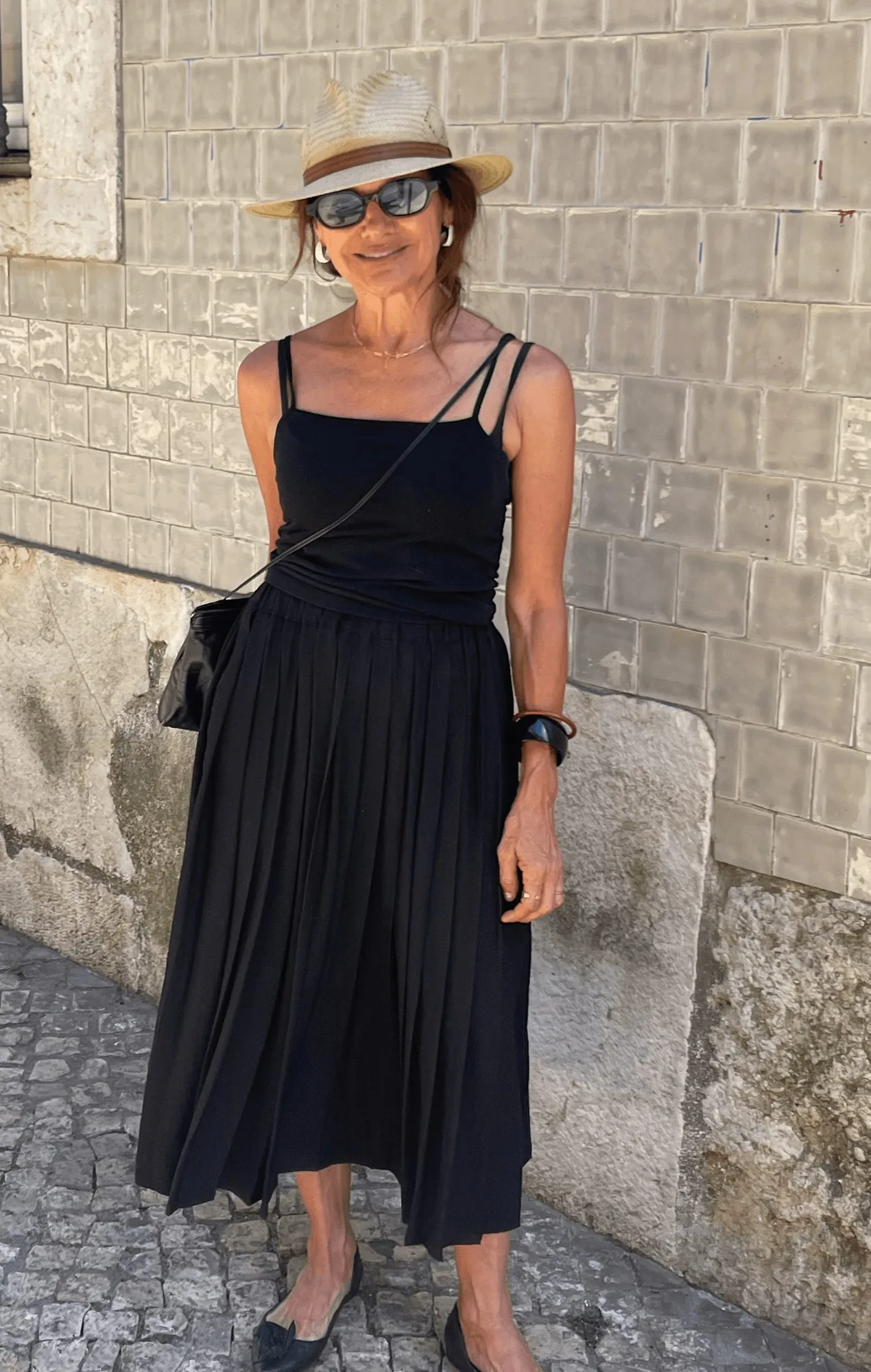 Carla Manuel in Lisbon wearing a black Kites dress